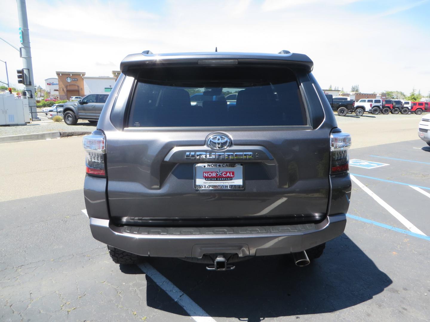 2021 CHARCOAL /BLACK Toyota 4Runner SR5 Premium 4WD (JTENU5JR0M5) with an 4.0L V6 DOHC 24V engine, 5A transmission, located at 2630 Grass Valley Highway, Auburn, CA, 95603, (530) 508-5100, 38.937893, -121.095482 - Clean SR5 Premium 7 passenger with a set of Bilstein 5100 series front struts and rear shocks, Bilstein 1" rear springs, 17" KMC 544 wheels, and Toyo RT Trail tires. - Photo#5